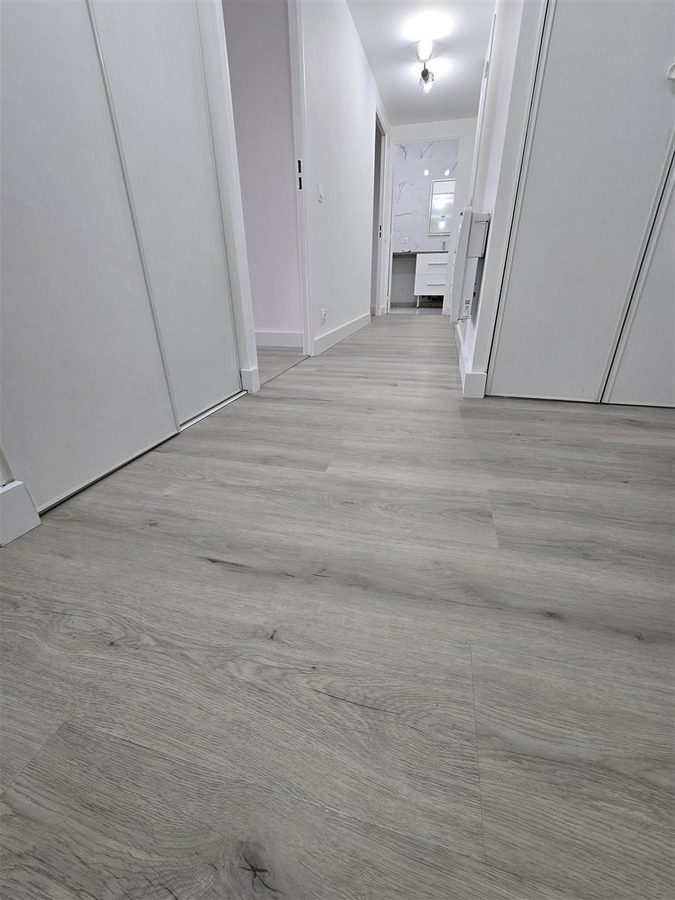 Pose lame LVT couloir appartement Bonneville